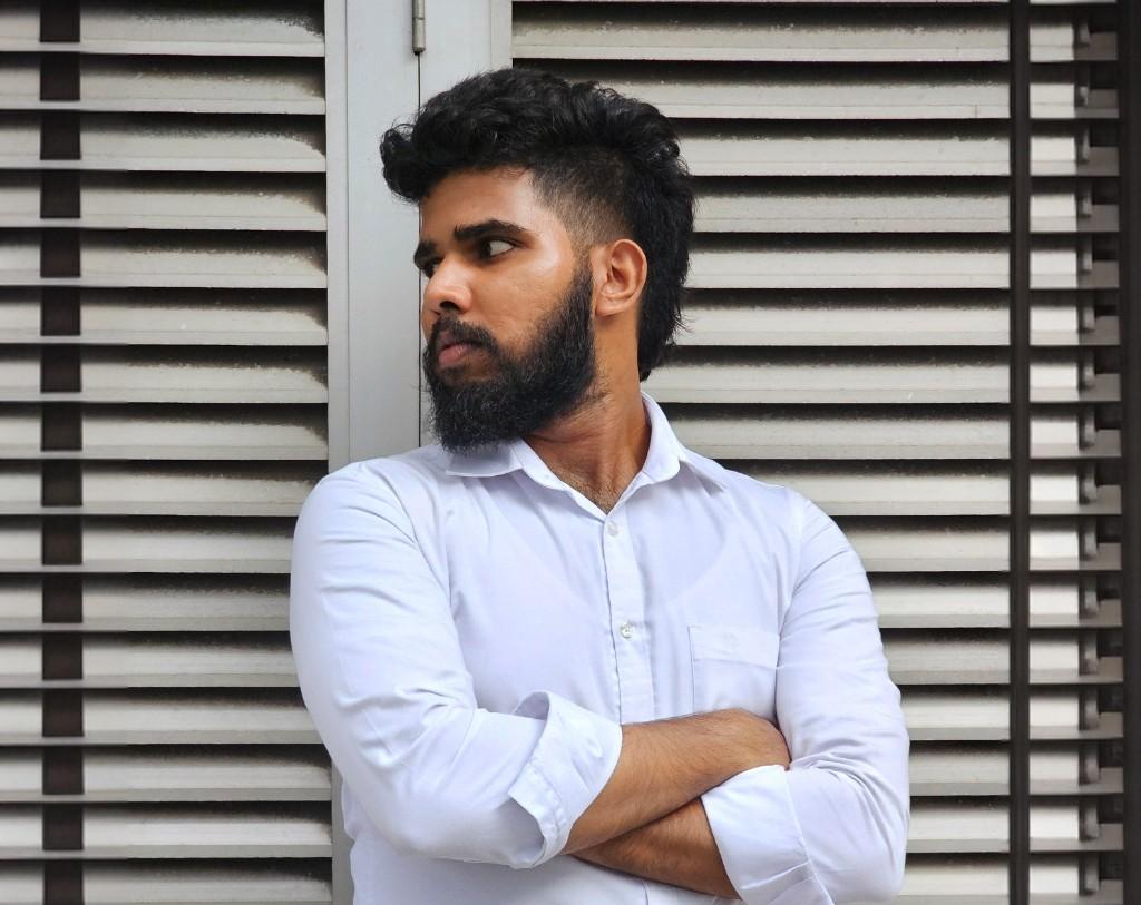 Dilan Sachintha portrait with louvre background